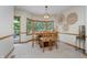 Sunny eat-in kitchen area with large windows and decorative accents at 815 Copperfield Ln, Danville, IN 46122