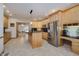 This kitchen is equipped with granite countertops, modern cabinetry, stainless steel appliances, and a center island with pendant lighting at 815 Copperfield Ln, Danville, IN 46122