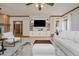 Inviting living room featuring a built-in media center, plush white seating, and a stylish area rug at 815 Copperfield Ln, Danville, IN 46122