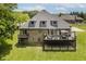 Spacious home featuring a large deck perfect for entertaining, overlooking a well-maintained lawn at 815 Copperfield Ln, Danville, IN 46122