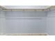 Walk-in closet with rod and shelving offering ample storage at 8355 Fieldfare Way, Indianapolis, IN 46237