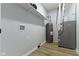 Utility room featuring a water heater, HVAC system, and storage shelves at 8355 Fieldfare Way, Indianapolis, IN 46237