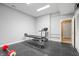 Basement workout area with equipment and rubber mat floor at 9399 Irishmans Run Ln, Zionsville, IN 46077