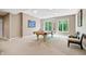 Recreation room featuring a pool table, neutral carpet, and bright, natural light at 9399 Irishmans Run Ln, Zionsville, IN 46077