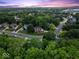 Beautifully landscaped home nestled among mature trees in a serene neighborhood at 9703 Fortune Dr, Fishers, IN 46037