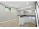Finished basement with a wet bar that includes a sink and cabinets at 9703 Fortune Dr, Fishers, IN 46037