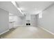 Finished basement area featuring built-in cabinetry, carpet flooring, and a dry bar at 9703 Fortune Dr, Fishers, IN 46037