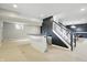 Finished basement featuring a wet bar, carpeted floors and a staircase at 9703 Fortune Dr, Fishers, IN 46037