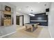 Finished basement featuring a pool table, dart board, and black accent wall at 9703 Fortune Dr, Fishers, IN 46037
