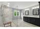 Modern bathroom boasting a glass enclosed shower, double sink vanity, and marble tile flooring at 9703 Fortune Dr, Fishers, IN 46037
