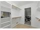 Spacious closet showcasing shelving and racks with a view of the room's interior at 9703 Fortune Dr, Fishers, IN 46037
