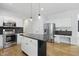 Lovely kitchen featuring a center island, stainless steel appliances, and ample counter space at 9703 Fortune Dr, Fishers, IN 46037