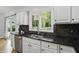 Charming kitchen featuring granite counters, stainless appliances, and white cabinetry at 9703 Fortune Dr, Fishers, IN 46037