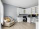 Comfortable home office with built-in shelves and cabinets at 9703 Fortune Dr, Fishers, IN 46037