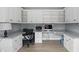 Home office featuring built-in cabinets and a large desk space at 9703 Fortune Dr, Fishers, IN 46037