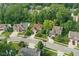 Aerial view of the home in a wooded neighborhood at 10402 Shakamak Way, Indianapolis, IN 46239