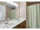 Bathroom featuring double sinks and a mirror, perfect for your everyday needs at 10402 Shakamak Way, Indianapolis, IN 46239