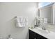 Bright bathroom with modern vanity, chrome finishes, and decorative mirror at 10402 Shakamak Way, Indianapolis, IN 46239