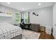 Bedroom featuring a desk, natural lighting, and space for personalized decor at 10402 Shakamak Way, Indianapolis, IN 46239