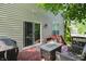 Wooden deck featuring outdoor seating near sliding glass door with grill at 10402 Shakamak Way, Indianapolis, IN 46239