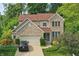 Beautiful two-story home with brick accents, manicured lawn, and attached garage at 10402 Shakamak Way, Indianapolis, IN 46239