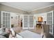 Open layout showcasing a seamless flow between the living area, foyer, and dining space at 10402 Shakamak Way, Indianapolis, IN 46239