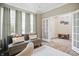 Inviting sitting area with comfortable seating, soft lighting, and stylish interior design at 10402 Shakamak Way, Indianapolis, IN 46239