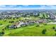 Areal of a sprawling golf community featuring luxury homes, scenic ponds and well-maintained fairways at 1135 Maclaren Ct, Franklin, IN 46131