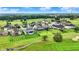 Golf course community showcasing well-manicured lawns, beautiful homes, and lush greenery at 1135 Maclaren Ct, Franklin, IN 46131