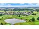 Aerial view of a golf course community with well-maintained lawns and various home styles at 1135 Maclaren Ct, Franklin, IN 46131