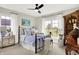 Cozy bedroom with plenty of sunlight, featuring a decorative bed frame and stylish furnishings at 1135 Maclaren Ct, Franklin, IN 46131