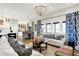 Large living space with an open floor plan connecting the living room, dining area and kitchen at 1135 Maclaren Ct, Franklin, IN 46131