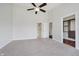 Main bedroom has neutral carpet, walk-in closet, and ensuite bathroom at 11872 Salerno Ct, Carmel, IN 46032