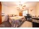 Comfortable bedroom with a ceiling fan, double bed, and lots of natural light at 1304 Old Hickory Cir, Greenwood, IN 46142