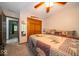 Comfortable bedroom with a ceiling fan, double bed, and lots of natural light at 1304 Old Hickory Cir, Greenwood, IN 46142