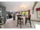 Modern kitchen with gray cabinets, a center island, and stainless steel appliances at 1304 Old Hickory Cir, Greenwood, IN 46142