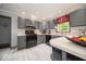 Updated kitchen with gray cabinets, modern appliances, and plenty of counter space at 1304 Old Hickory Cir, Greenwood, IN 46142