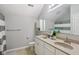 Well-lit bathroom features a double vanity, tile flooring, and a shower-tub combination at 15528 Bowie Dr, Westfield, IN 46074