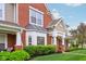 Charming exterior view highlighting manicured landscaping and the architectural details of the inviting front entrance at 15528 Bowie Dr, Westfield, IN 46074