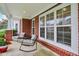 Inviting porch with seating, offering a cozy spot to relax and enjoy the neighborhood views at 15528 Bowie Dr, Westfield, IN 46074