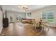 Spacious living room with wood floors, recessed lighting, a ceiling fan, and ample natural light at 15528 Bowie Dr, Westfield, IN 46074
