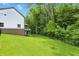Expansive backyard with lush green grass and a secure black fence, perfect for outdoor activities and relaxation at 16244 Perrault Ct, Fishers, IN 46040