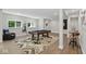Basement featuring a pool table, bar area, custom area rug, and ample space at 16244 Perrault Ct, Fishers, IN 46040