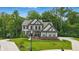 Beautiful two-story home with well-maintained lawn, landscaping, and hardscaped driveway at 16244 Perrault Ct, Fishers, IN 46040