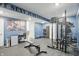 This in-home gym features modern workout equipment and motivational wall art, creating an ideal fitness space at 16244 Perrault Ct, Fishers, IN 46040