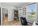 Bright office with lots of light, built in shelves, and access to dining area at 16244 Perrault Ct, Fishers, IN 46040