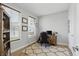 Well-lit home office with a desk and large windows at 16244 Perrault Ct, Fishers, IN 46040