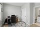 Spacious home office with lots of light and a view to bathroom at 16244 Perrault Ct, Fishers, IN 46040