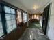 Cozy sunroom with multiple windows, vintage decor, and natural light to create an inviting space at 1630 E 18Th St, Indianapolis, IN 46218