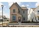 Charming two-story home boasts a mix of brick and siding and professional landscaping at 1655 Fernley Dr, Westfield, IN 46074